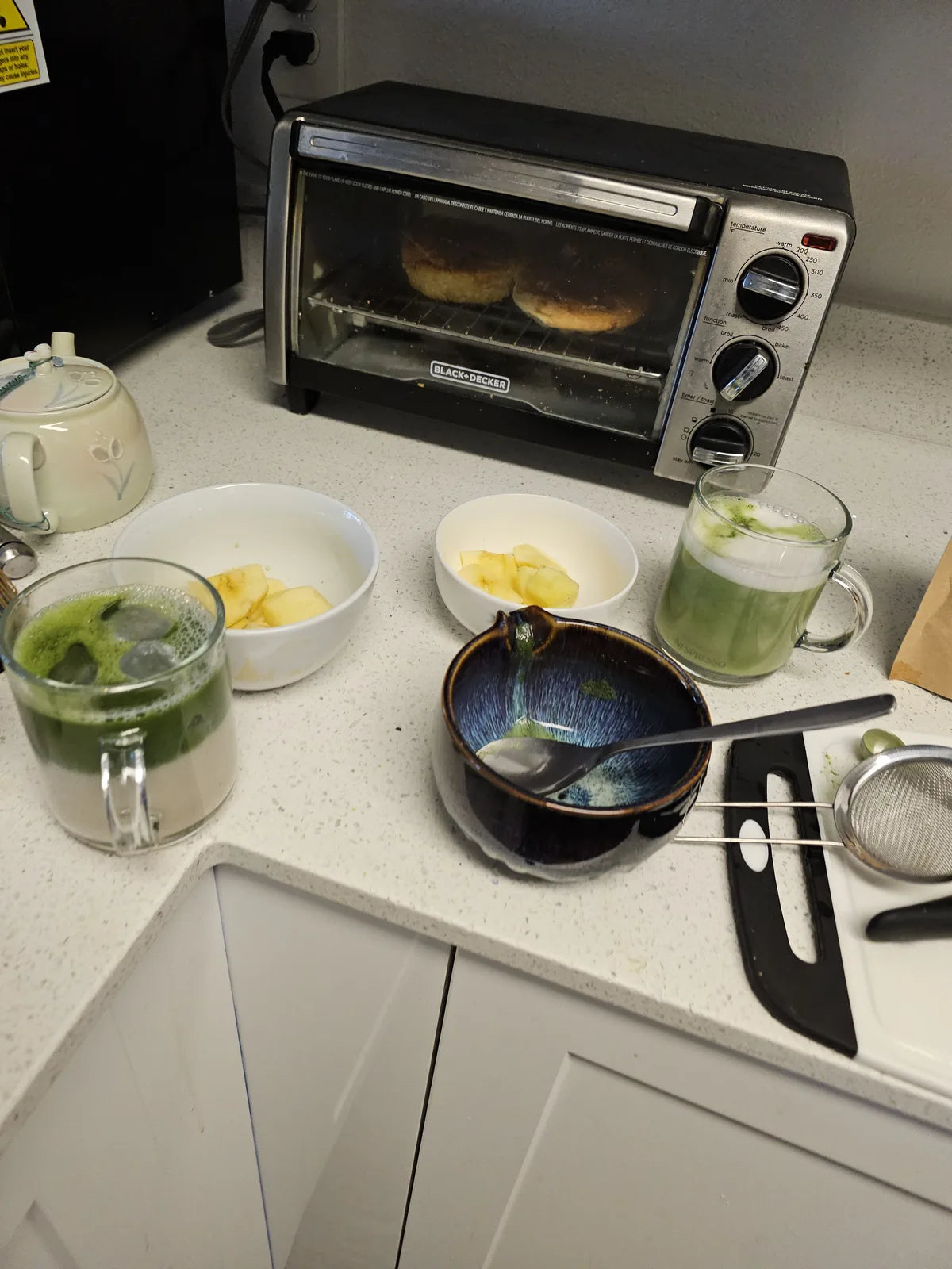Morning matcha with breakfast on the kitchen counter